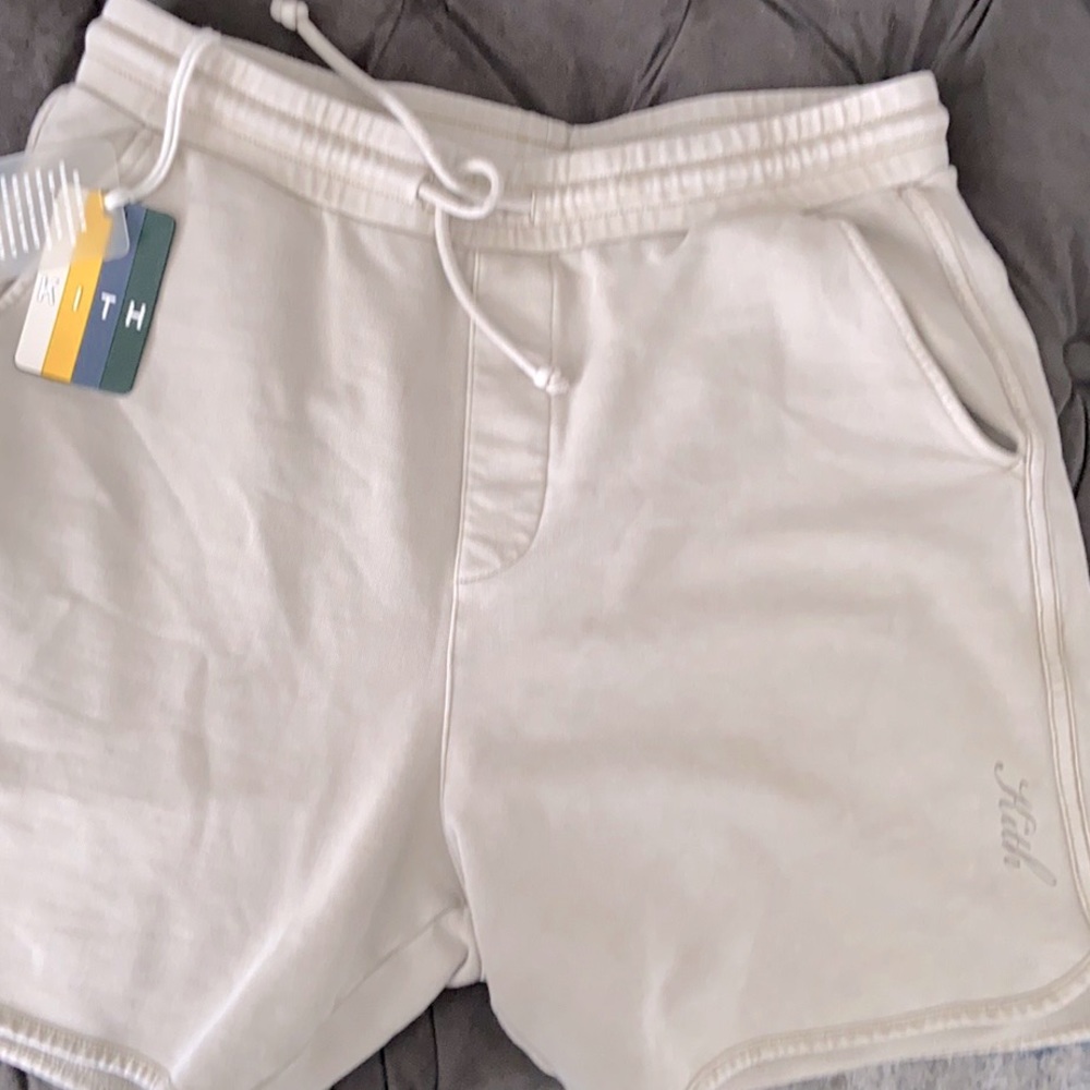 KITH medium tan sweat shorts.